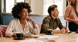 Business workers in conference room.